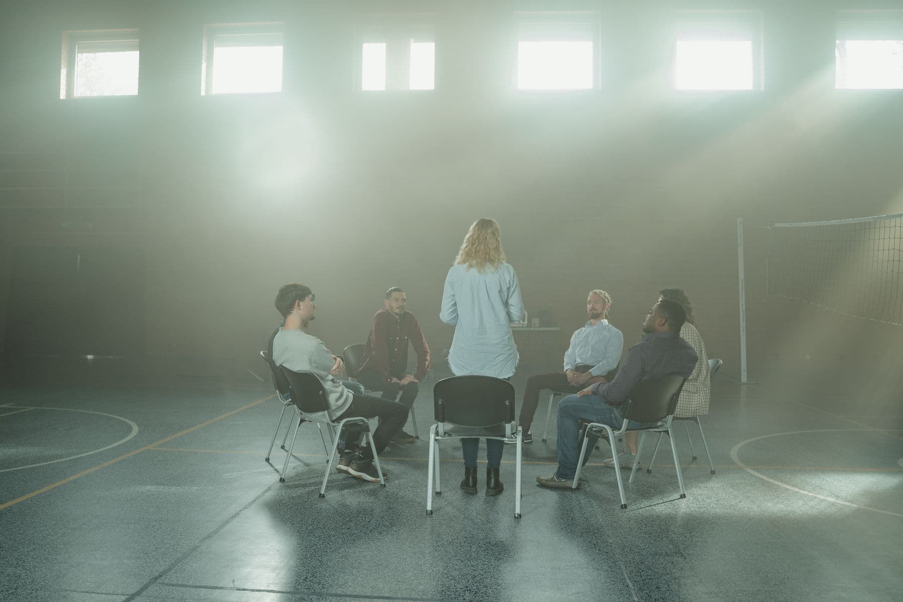 A recovery support circle meeting together.